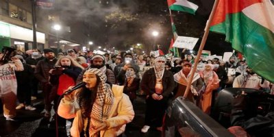 Four masked individuals remove Israeli flags at a Philadelphia cafe. - SarkariResult
